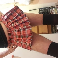 Panty boy wearing slutty schoolgirl skirt flashing pink pant