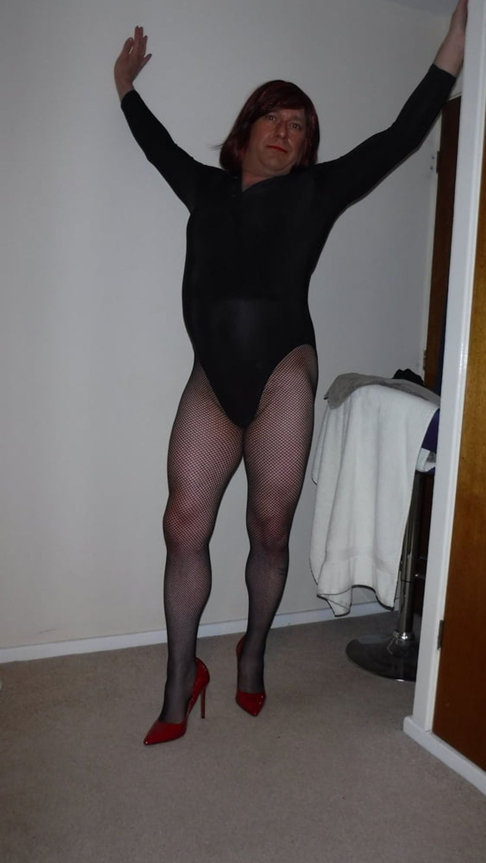 SISSY ROSIE IN FISHNET, RED HEELS AND BODYSUIT #10