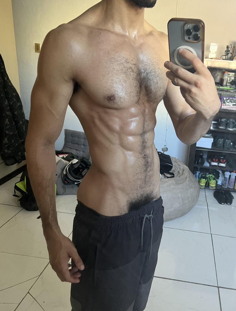 Sweaty fitness male body after running