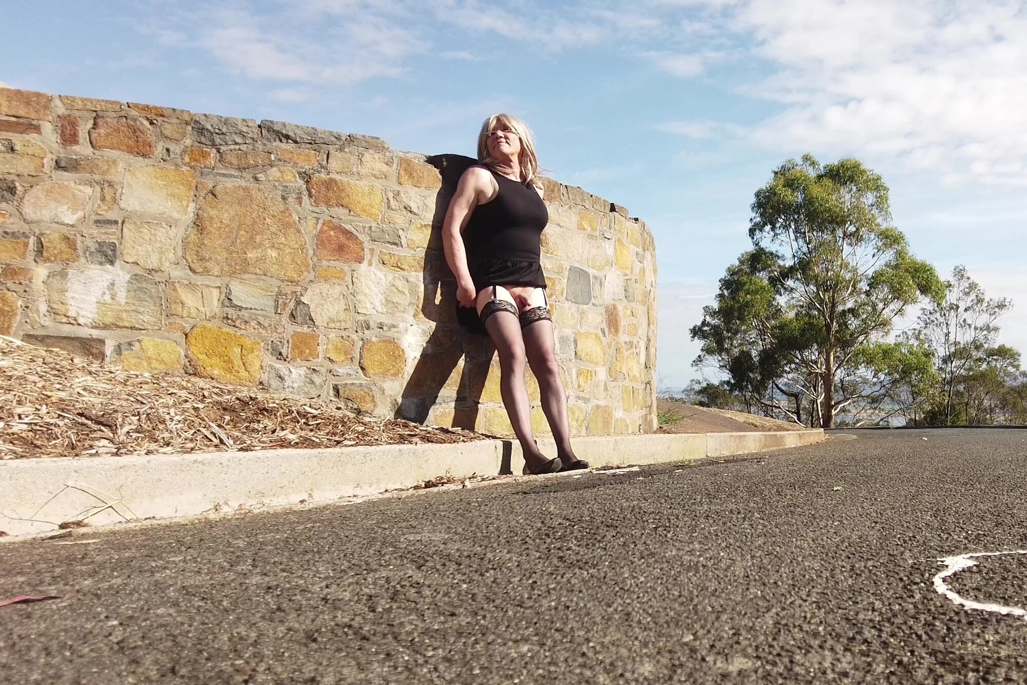 Crossdress Roadtrip - Sun baking against Stone Wall