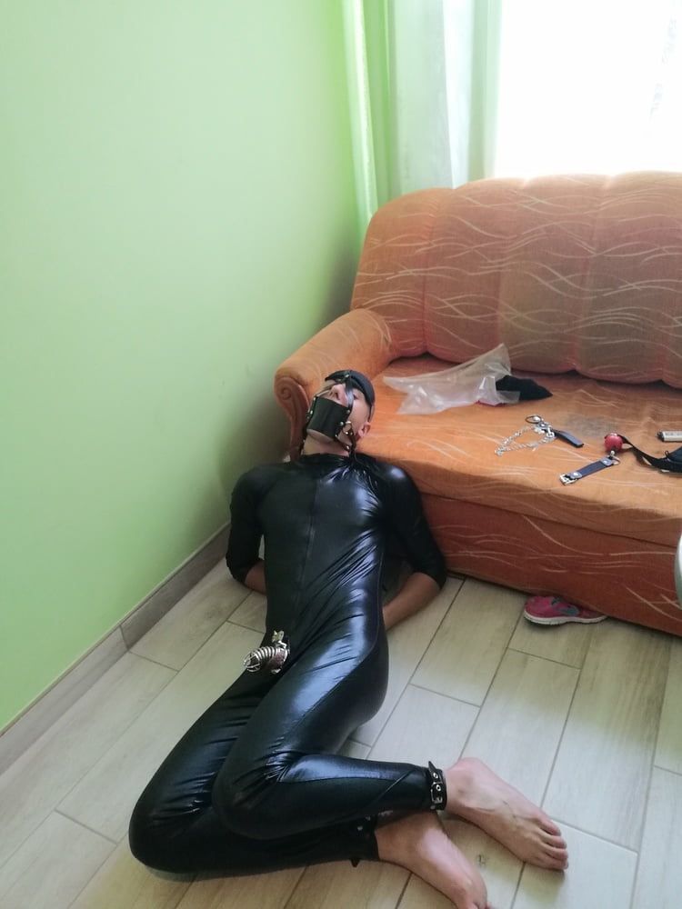 Young slave in latex and chastity cage  #18