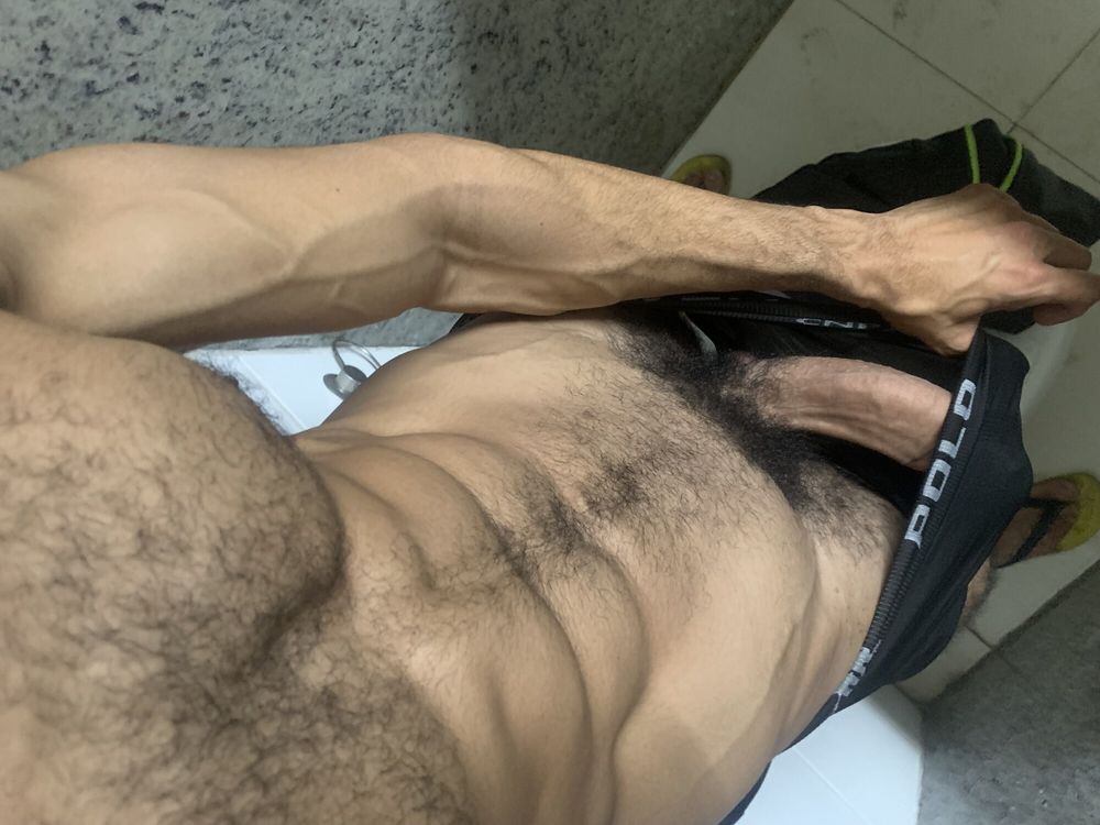 Huge 23cm dick of a very hard hairy male in the gym bathroom #10