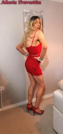    alessia travestita in red velvet dress         