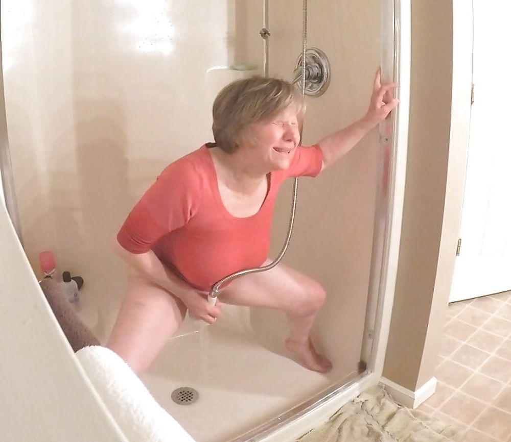 GILF masturbates in wet t-shirt #9