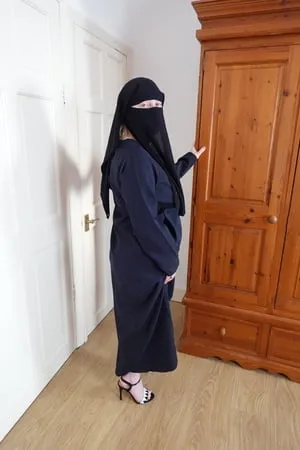 pale skin milf in burqa and niqab and high heels         