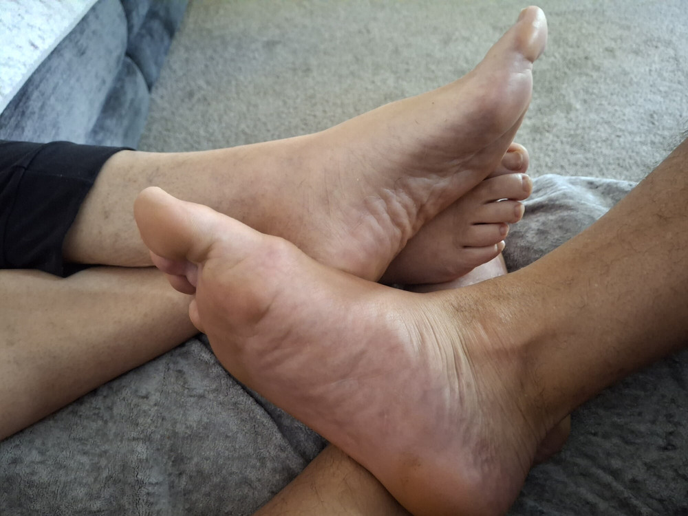 Playing footsie on the couch #12