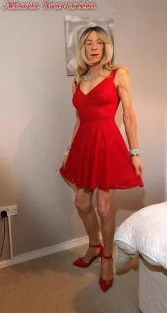    alessia travestita in flirty red dress         