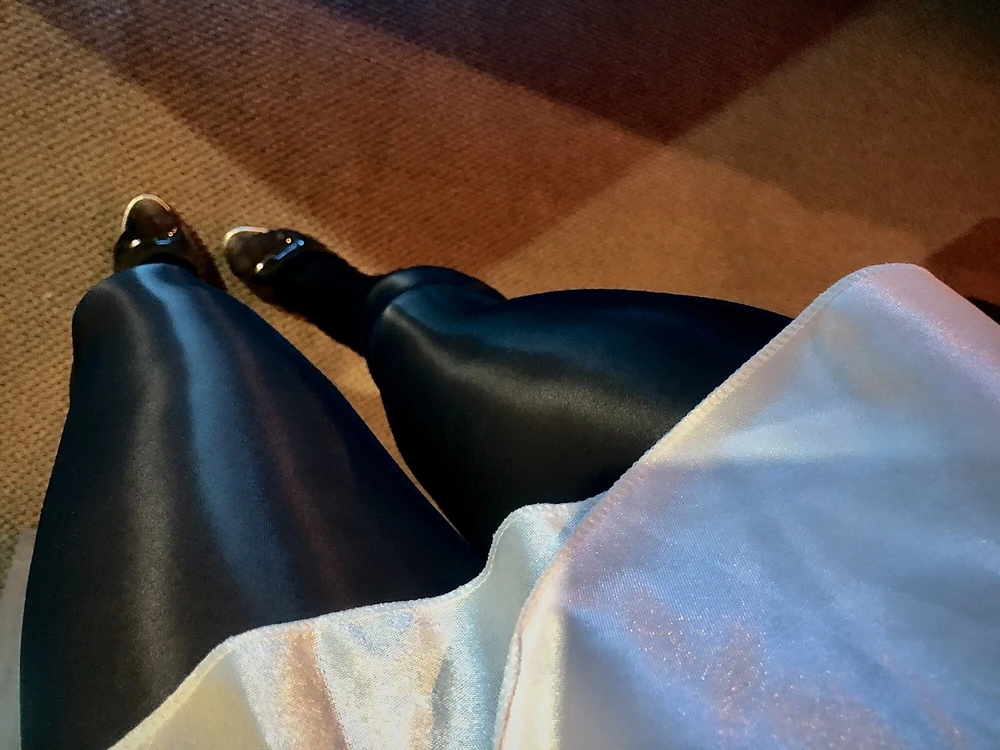 Moments of shiny legs, glossy tights and high heels,