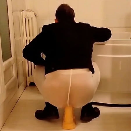 Dildo riding in the bathroom in open white pantyhose