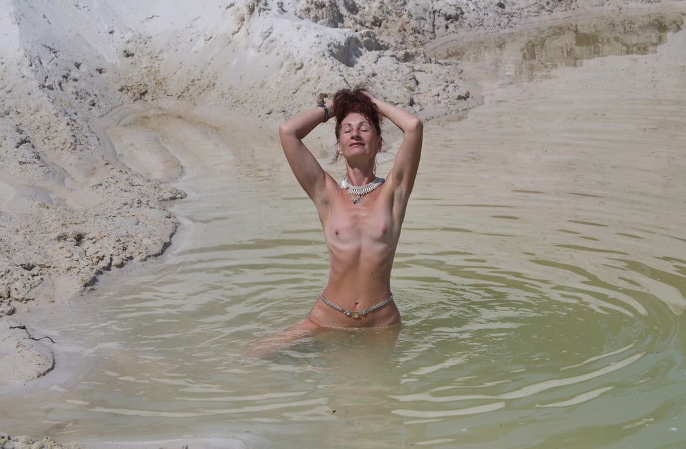 Bathing in white clay quarry #26