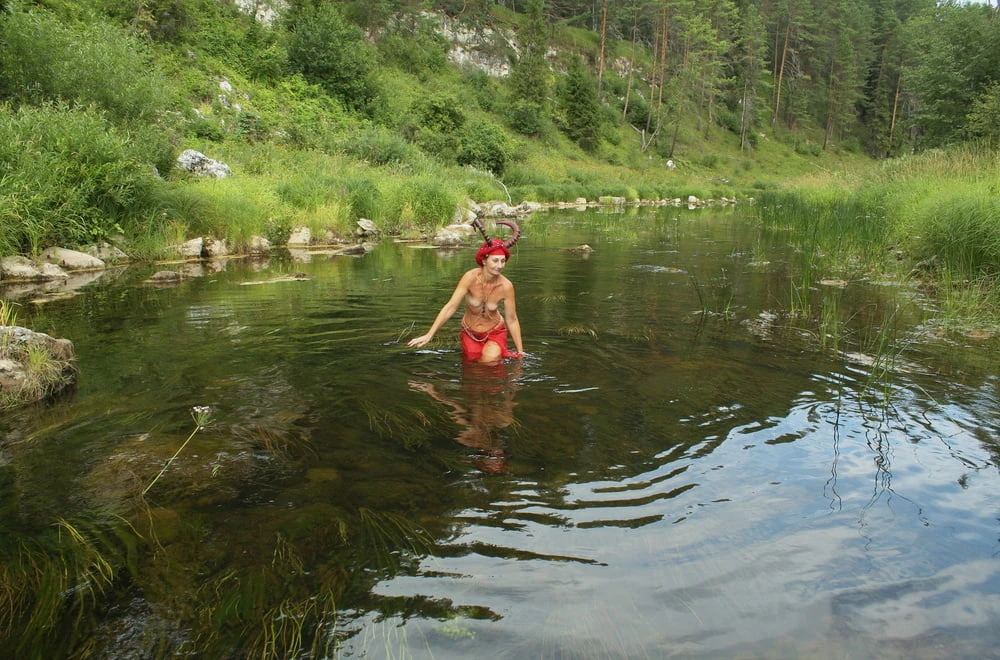 With Horns In Red Dress In Shallow River #6
