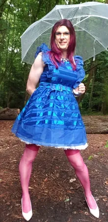 blue dress in the rain in july         