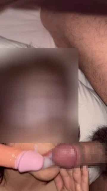 She sucks two dicks