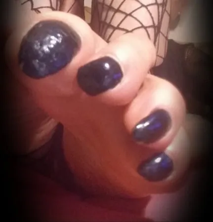 asian ts black toenails and fishnet         