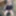Crossdresser Kellycd in black fishnet dress and nude pantyho