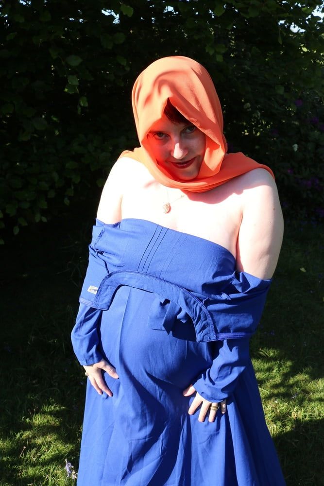 hijab and abaya flashing outdoors #32