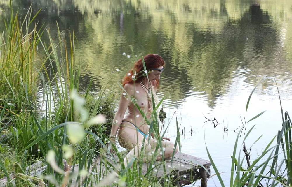 Nude on planked footway #7