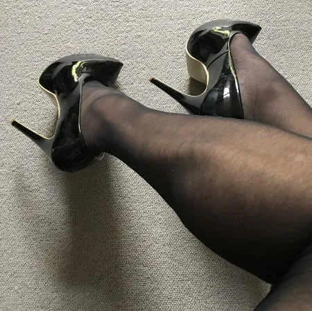 black tights heels close up           