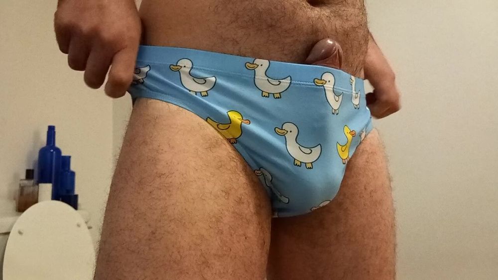 Small penis bulge cum in cute duck speedo, brief, trunks. #10