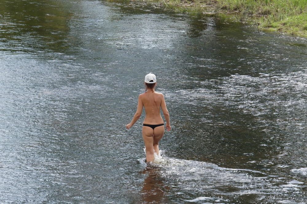 Nude in river's water #44