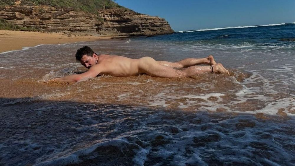 Flroian Johannes Mueller nude at the beach #11