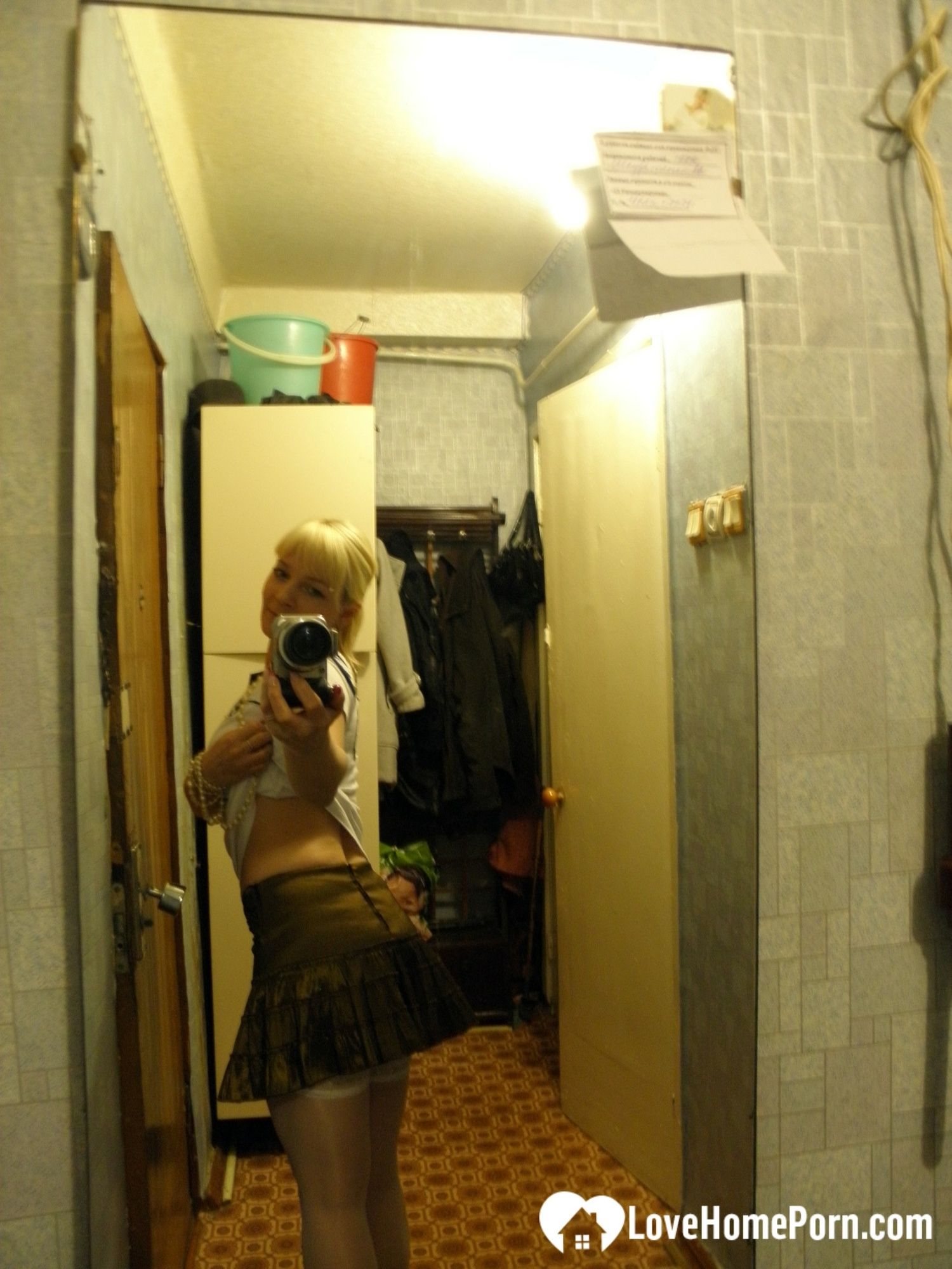 Aroused blonde in stockings taking naughty selfies #5