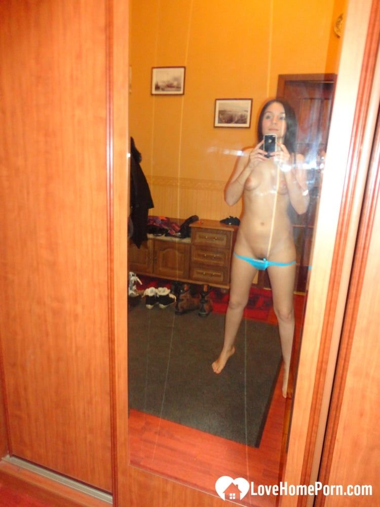Hot teen shows her body in the mirror #11