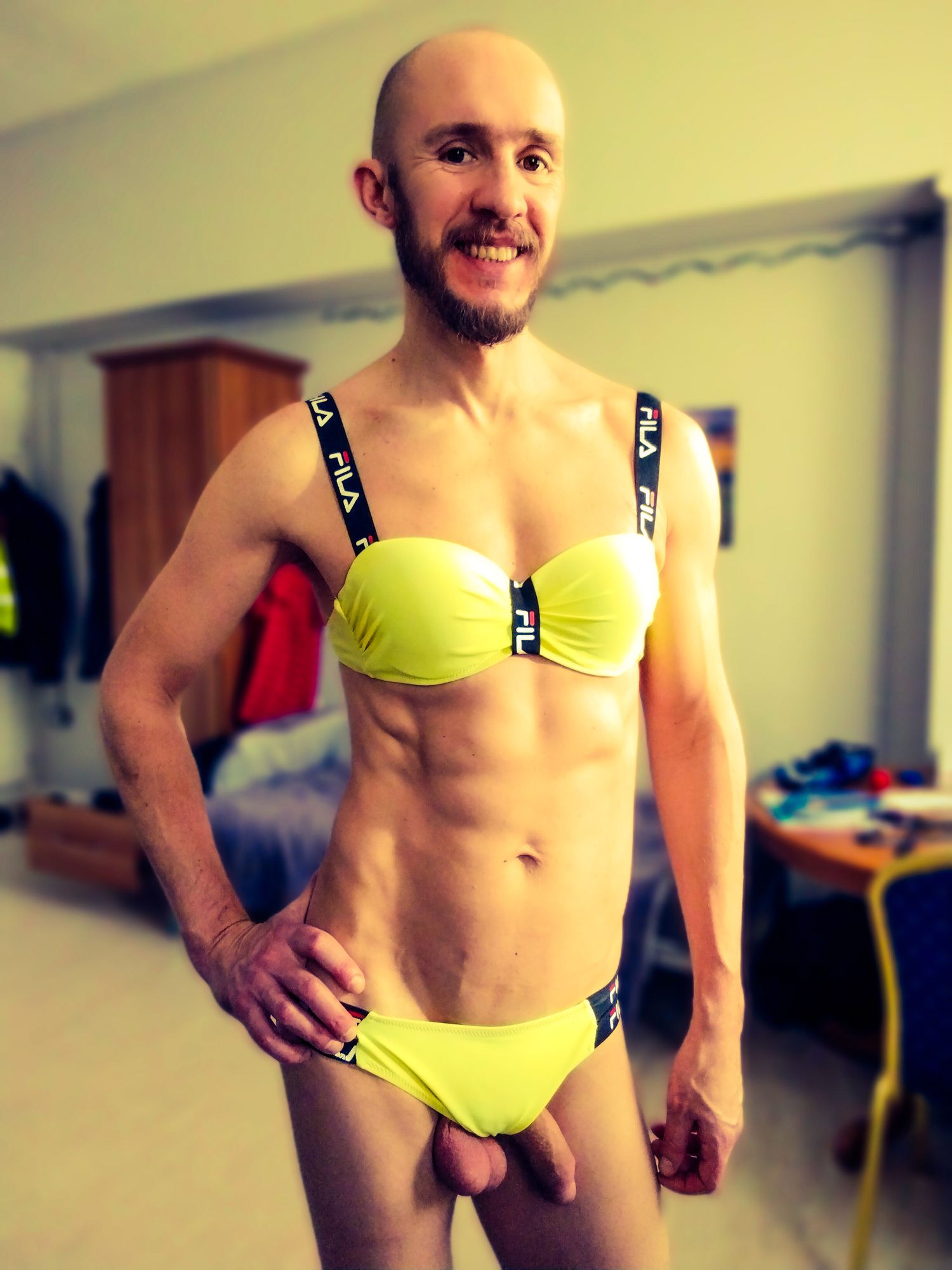 Bearded athletic man posing in yellow swimsuit  #11
