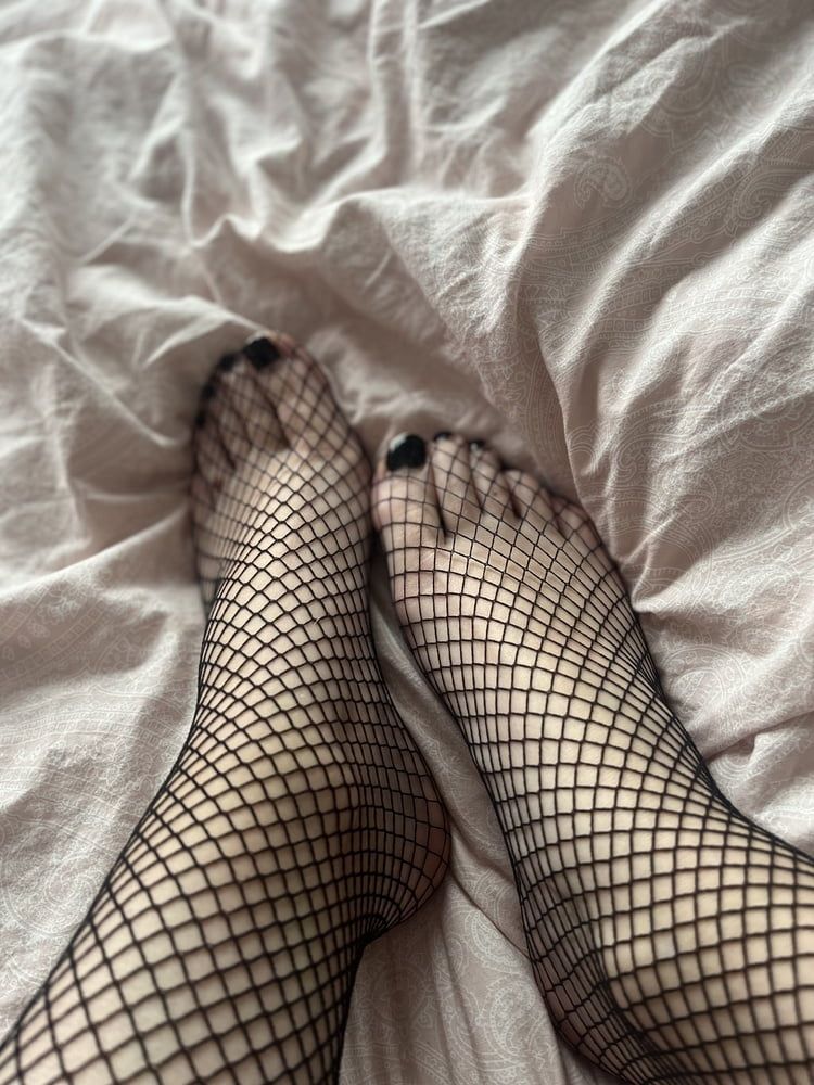 Foot with fishnet socks  #10