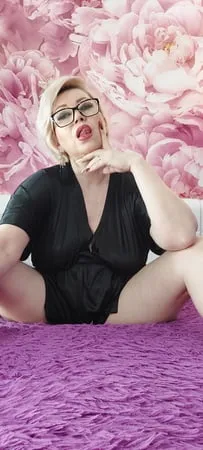 a cool mature bitch in a black negligee         