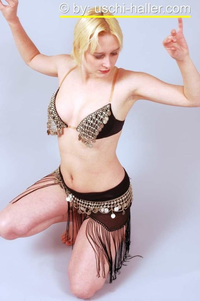 Photo shoot with blonde cum slut Dany Sun as a belly dancer #18