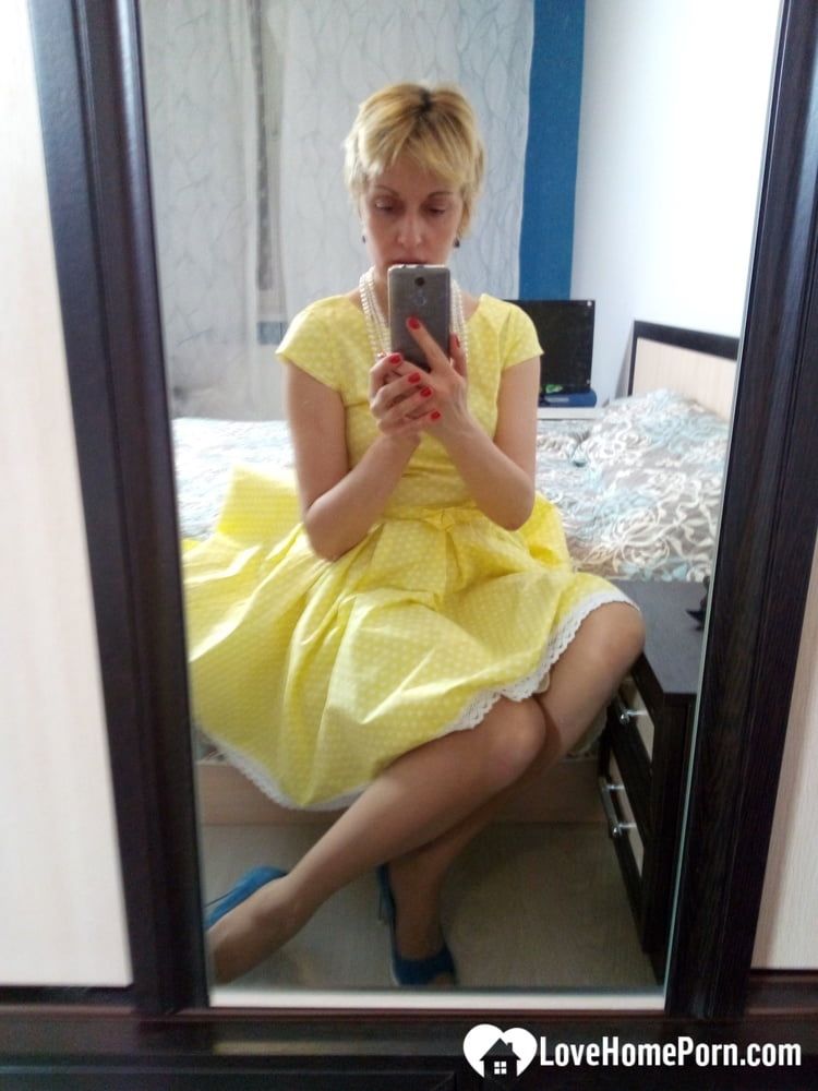 Stunning MILF puts on a yellow dress #27