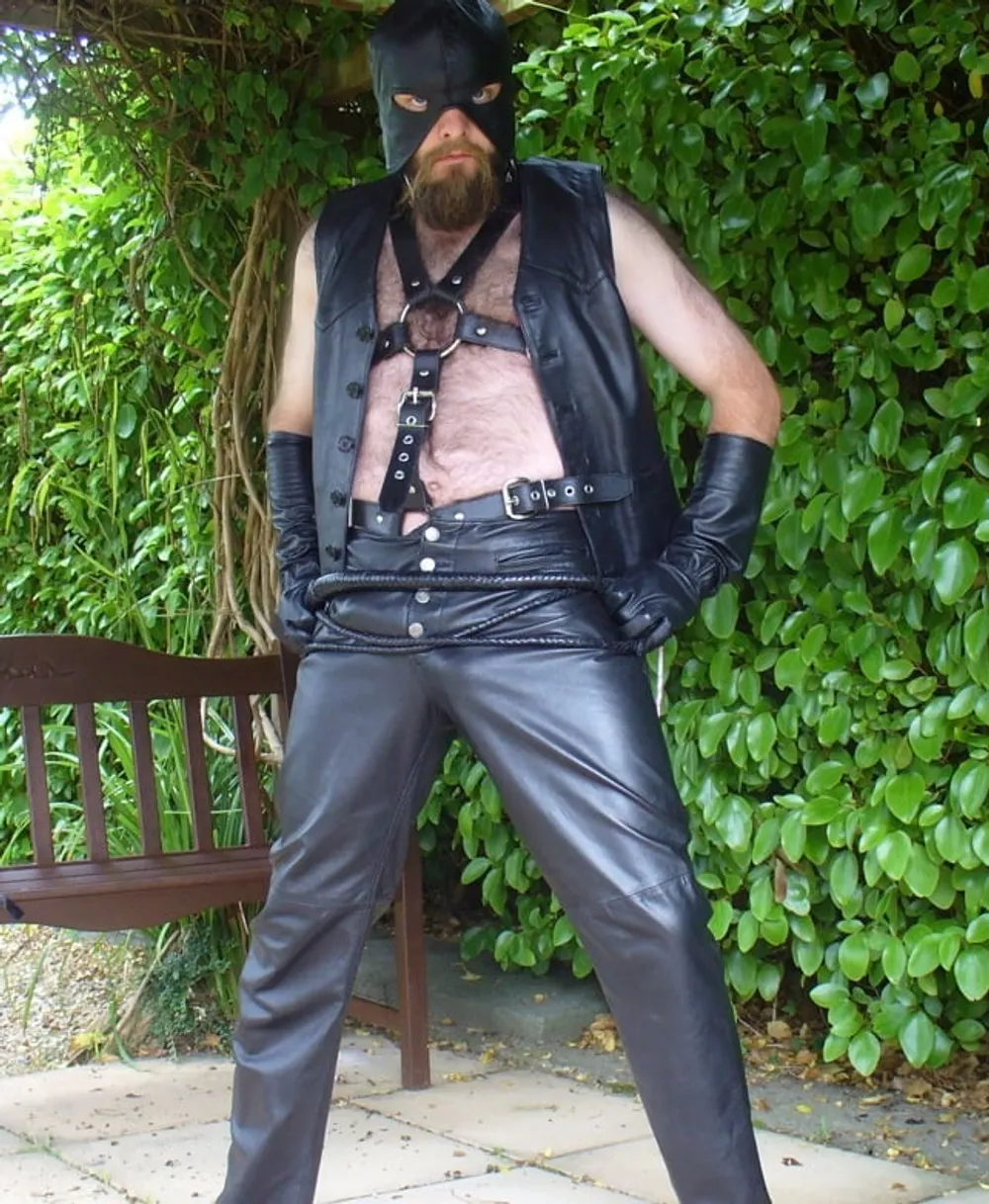 Leather Master outdoors in harness with whip #5