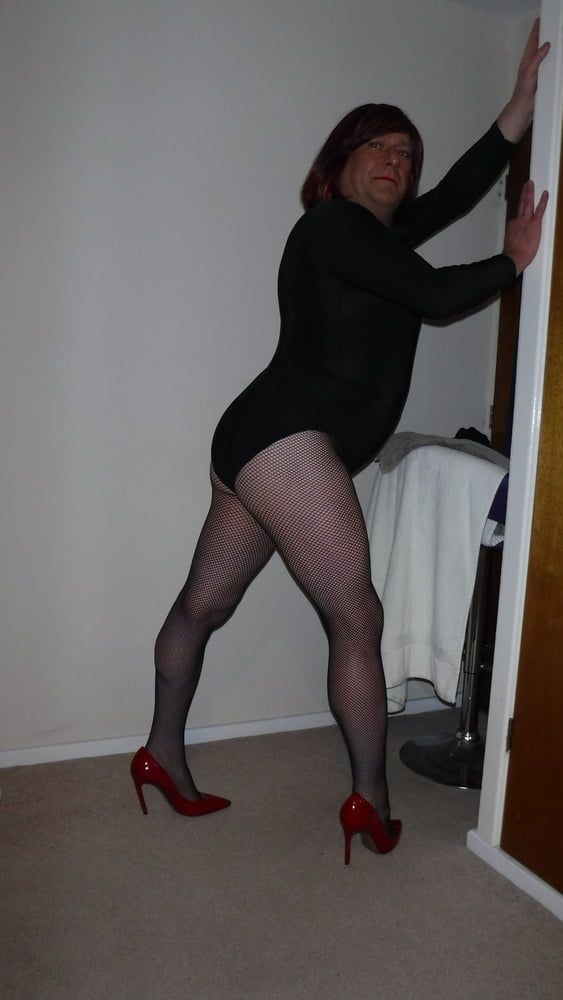 SISSY ROSIE IN FISHNET, RED HEELS AND BODYSUIT #12