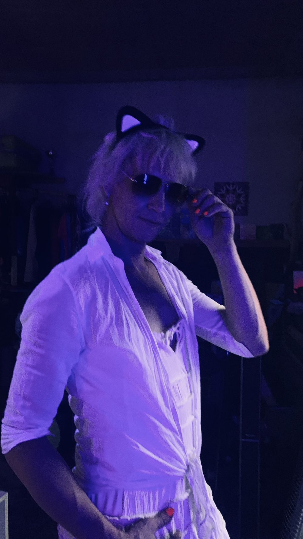 Black&amp;White cat posing in the sunglasses at UV light #4