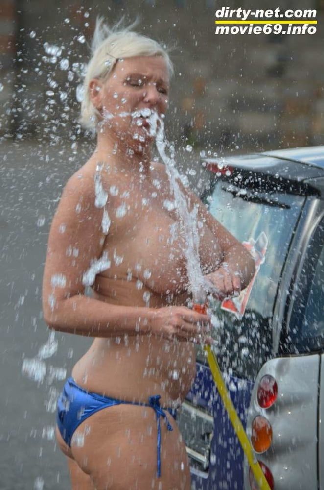 Jill Summer at the carwash in a bikini and topless #51