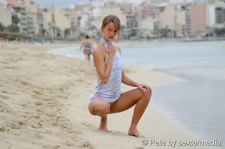 german amateur petty shows naked pussy on the beach         