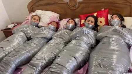   mummified girls barefoot in duct tape bondage         