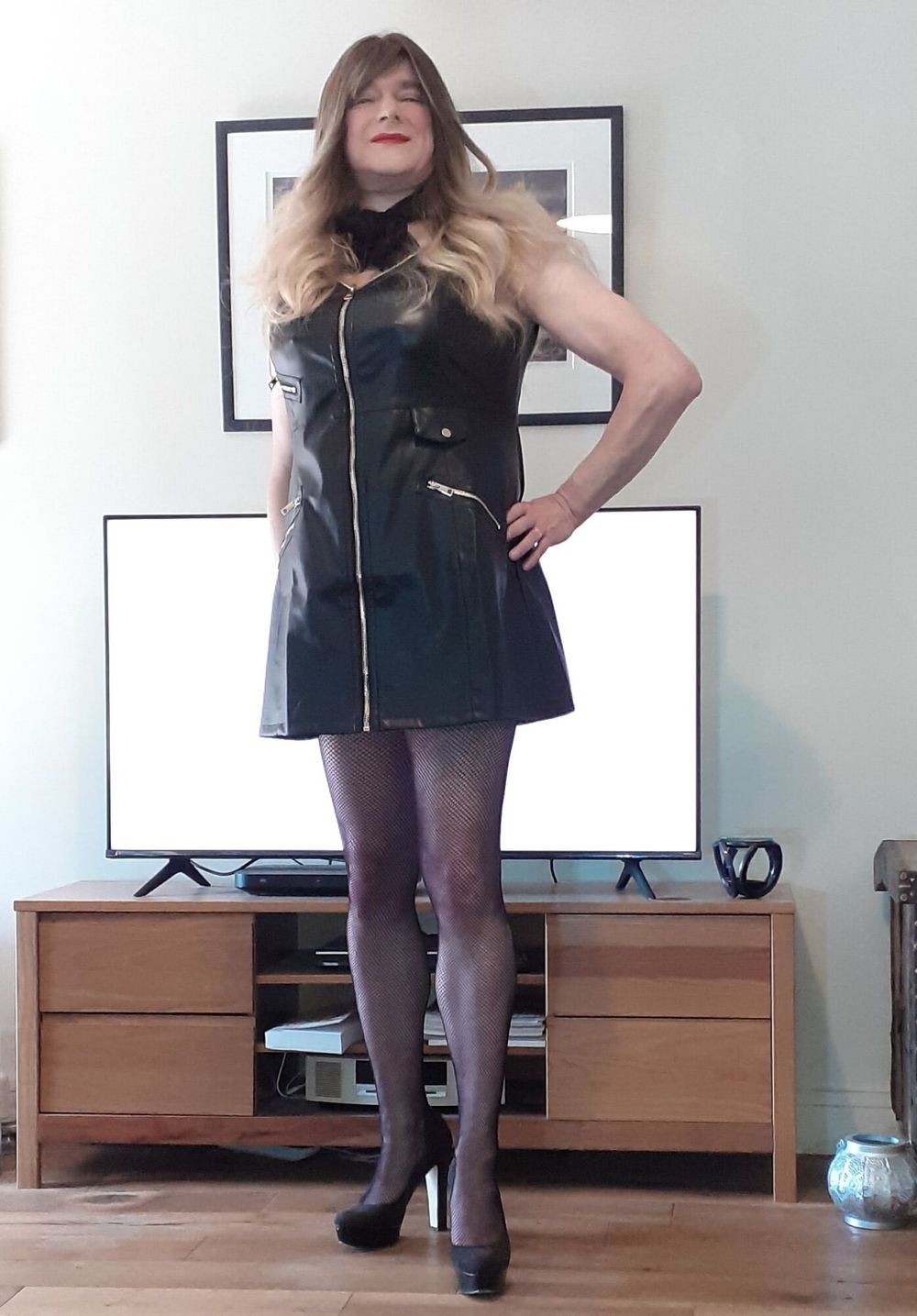 crossdressed in black leather dress #2