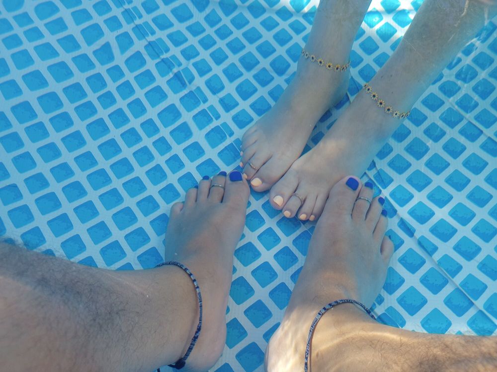 Showing off our pedicures in the pool #18