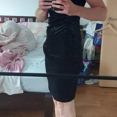 Wearing dessous and a dress