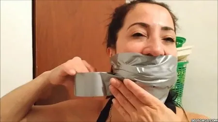 self gagged latina mom with a mouthful of socks selfgags         