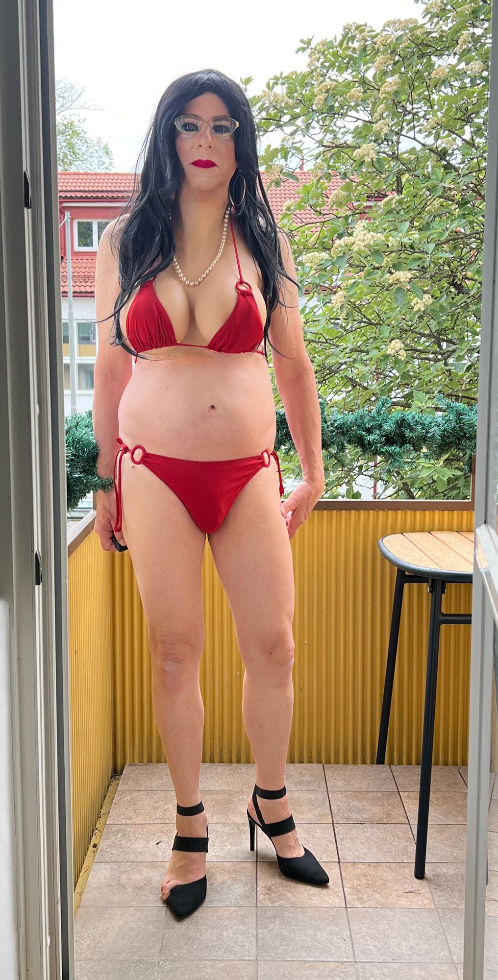 Busty sissy on the balcony #13