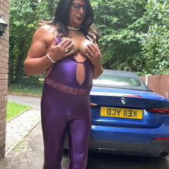 Sexy Crossdresser kellycd2022 in purple pvc catsuit and heel