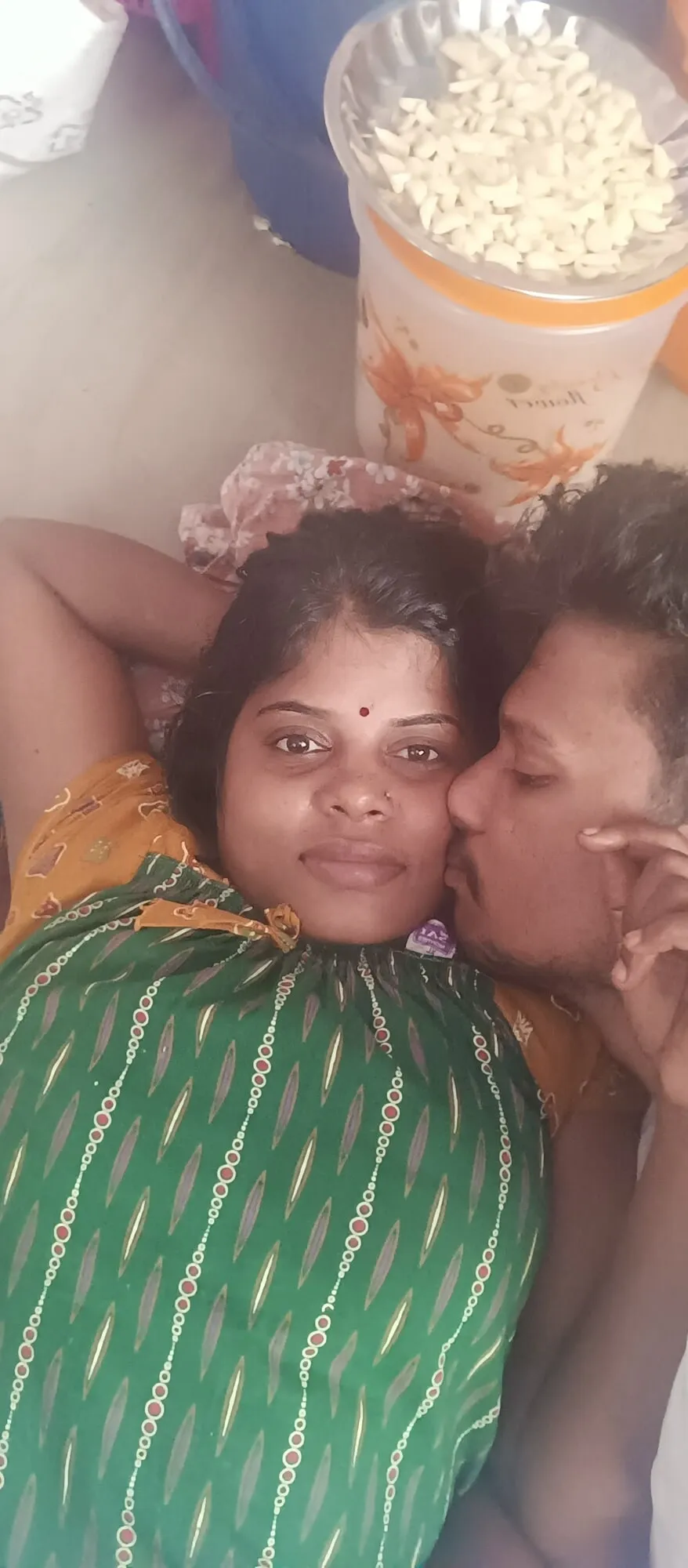 Indian wife and husband kissing