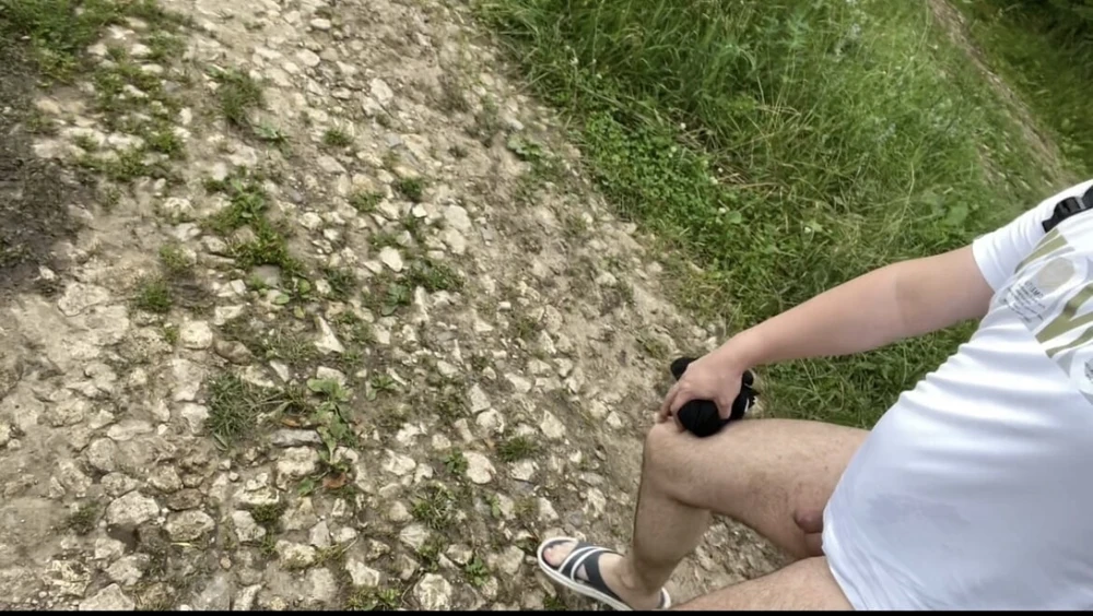 A photo of a naked walk in the summer forest #3