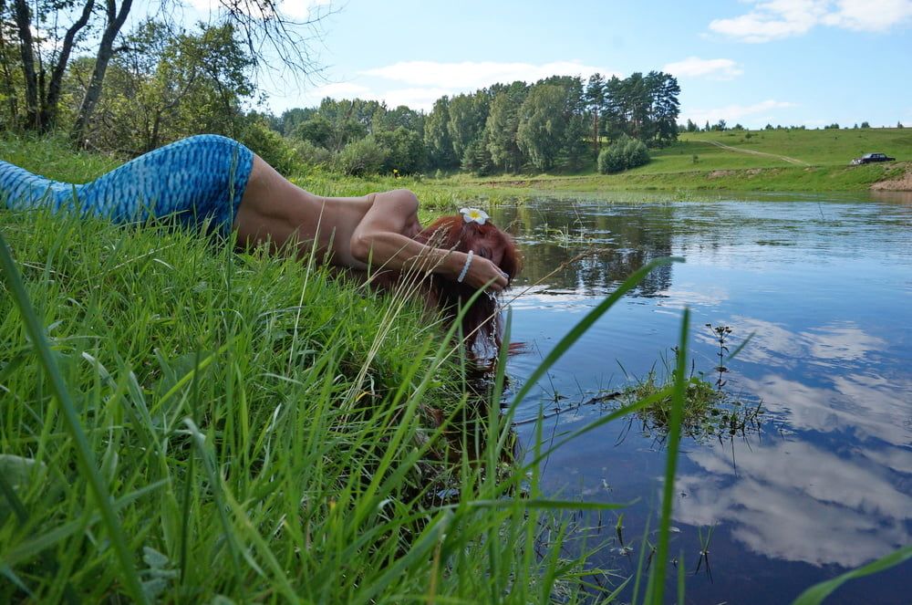 Mermaid plays with water #23