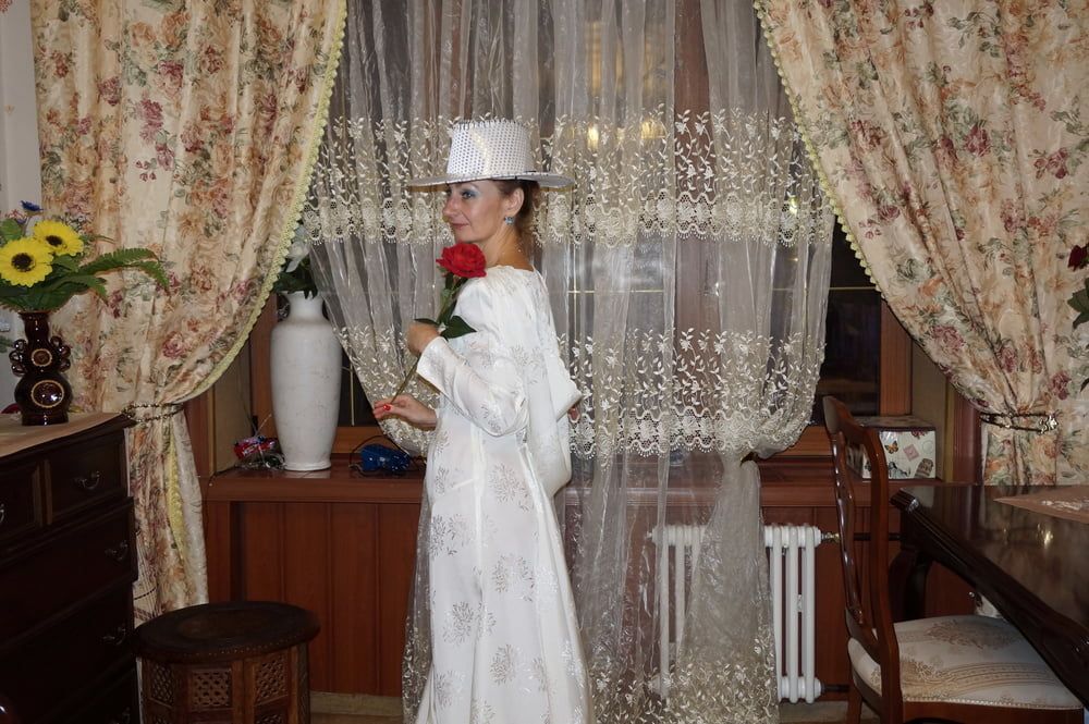 In Wedding Dress and White Hat #52