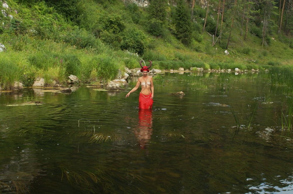 With Horns In Red Dress In Shallow River #12