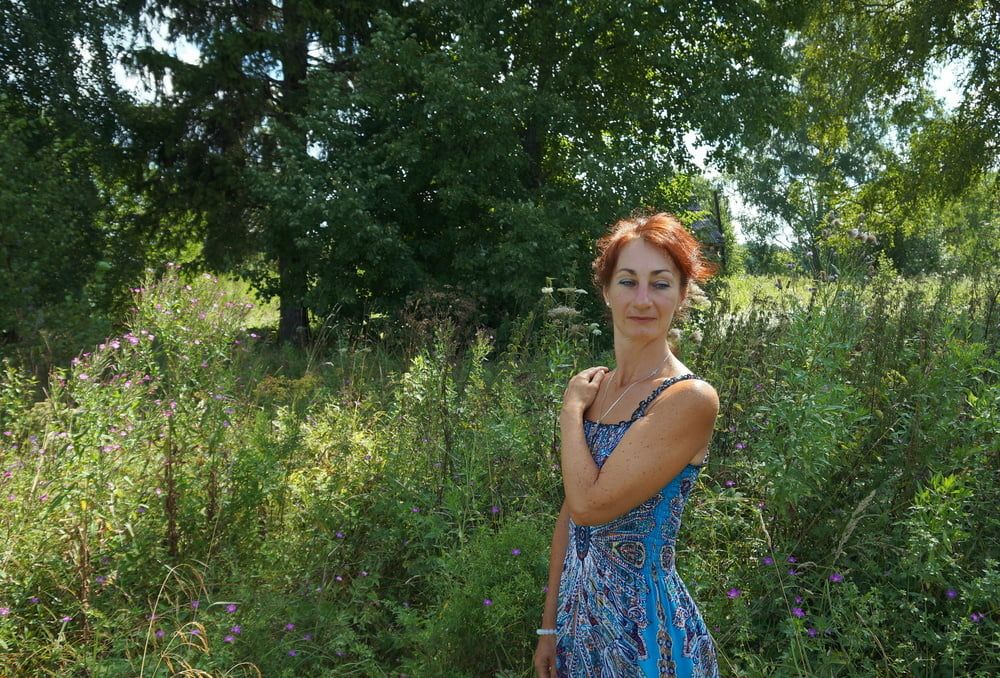 In blue dress in field #8